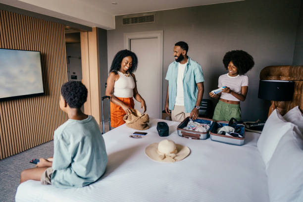 Family in hotel room getting ready to go to the beach