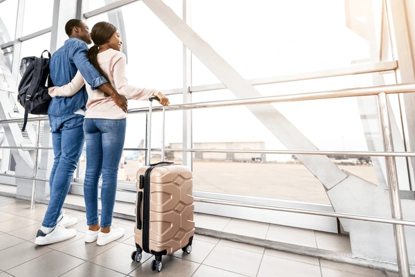 romantic-african-american-couple-standing-600nw-2612794883_converted